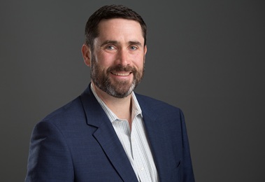 A head and shoulders photo of our COO, Jerry Barton